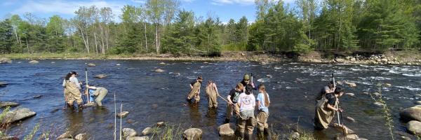 Students exploring the Ausable River